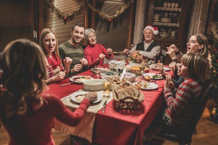Family around table for holidays