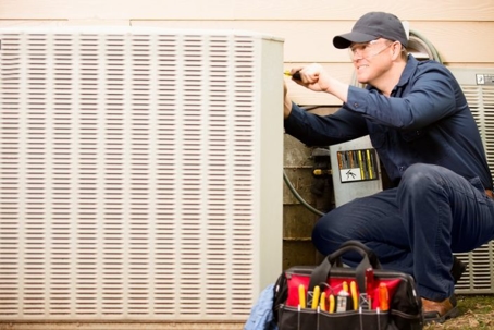 Technician working on HVAC
