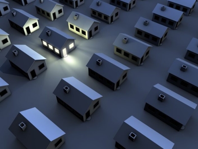 Neighborhood with one house lit up